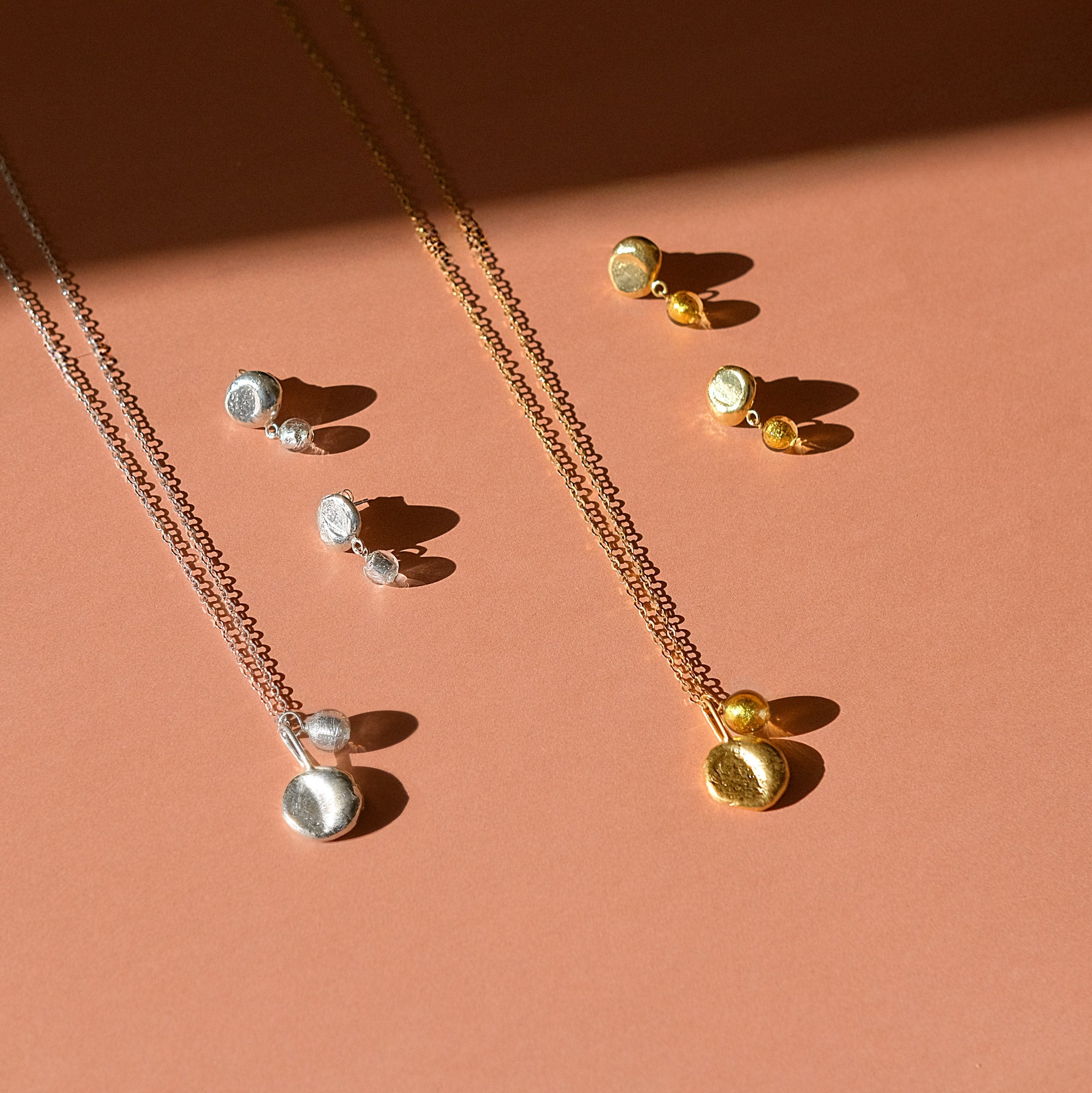 gold and silver moon necklace and earrings