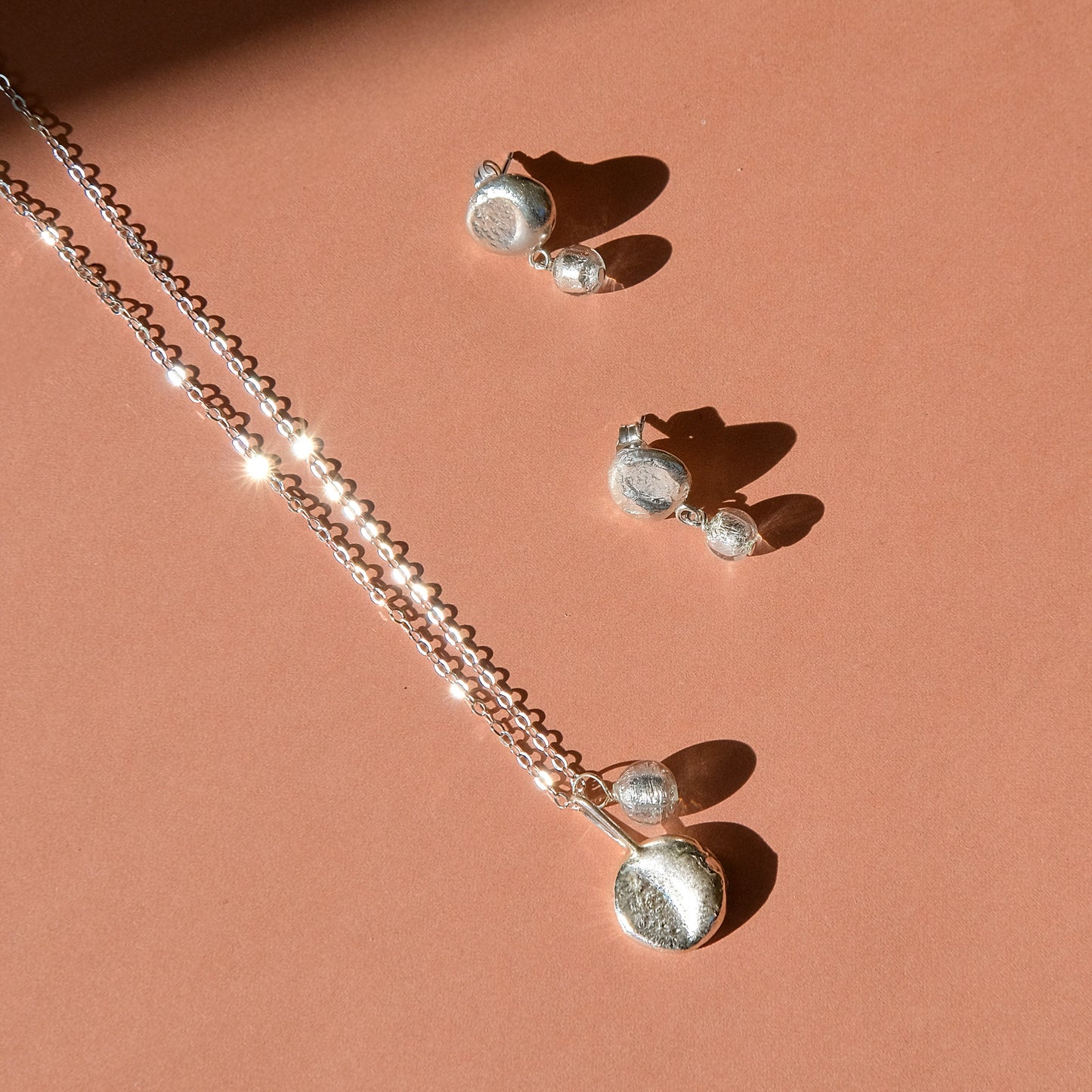 molten moon silver pendant necklace and moon stud earrings