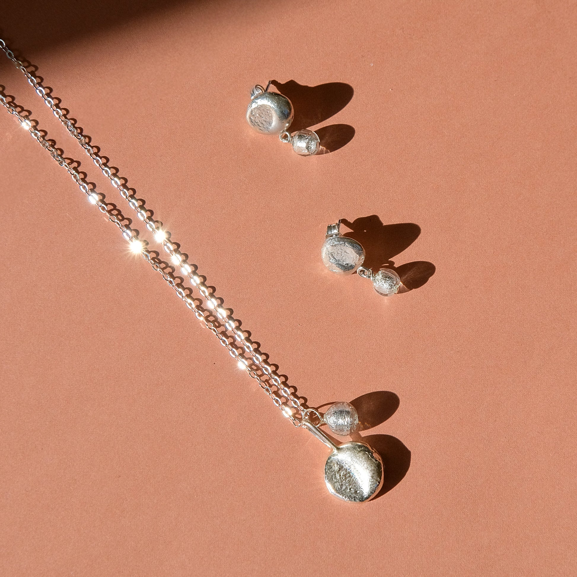 molten moon silver pendant necklace and moon stud earrings