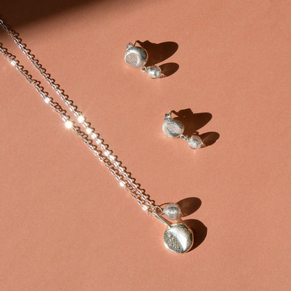 molten moon silver pendant necklace and moon stud earrings