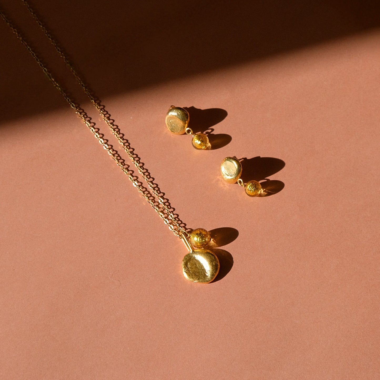 gold moon pendant necklace and moon stud earrings