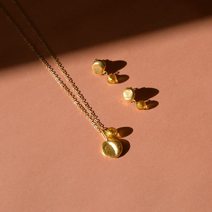 gold moon pendant necklace and moon stud earrings