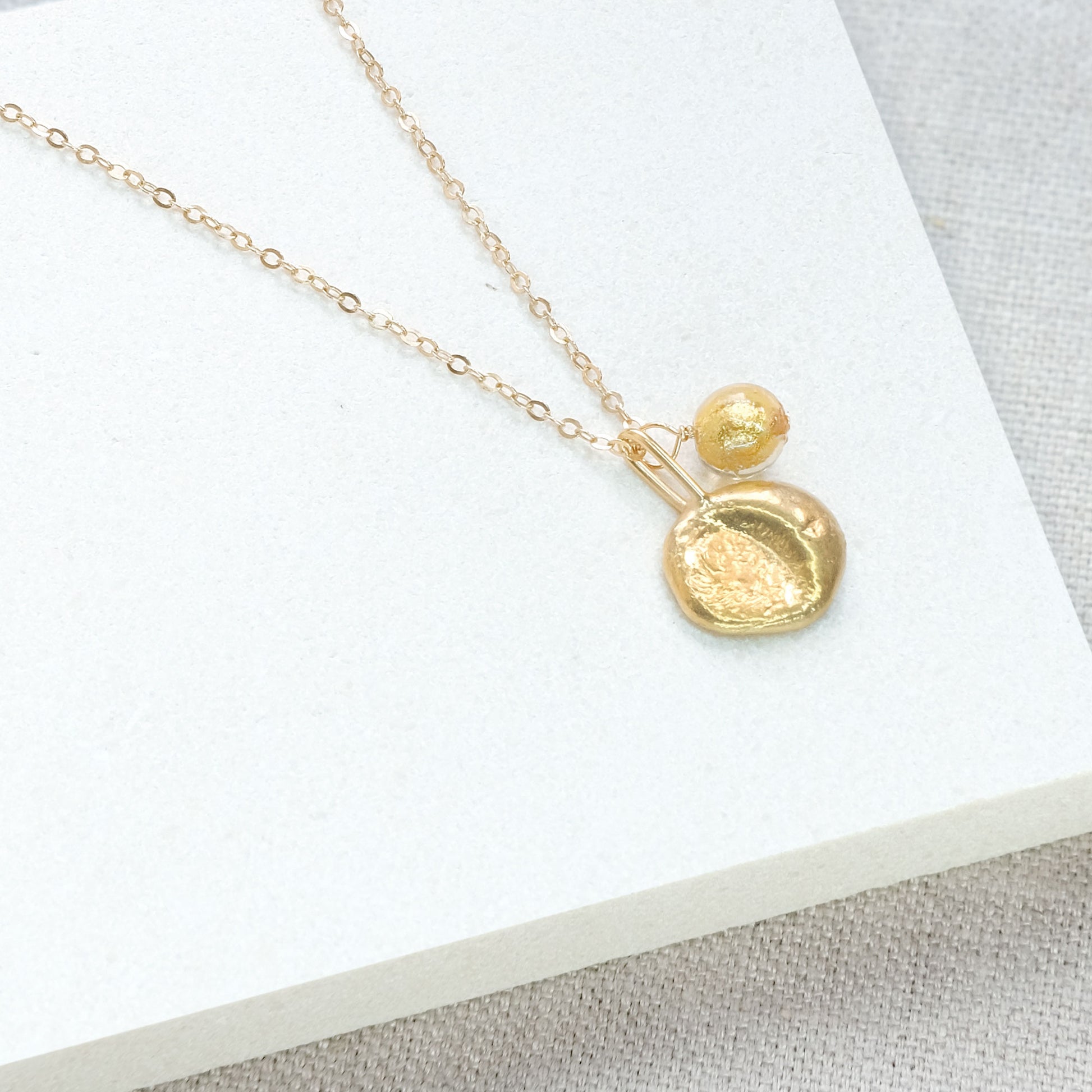 gold coin pendant necklace