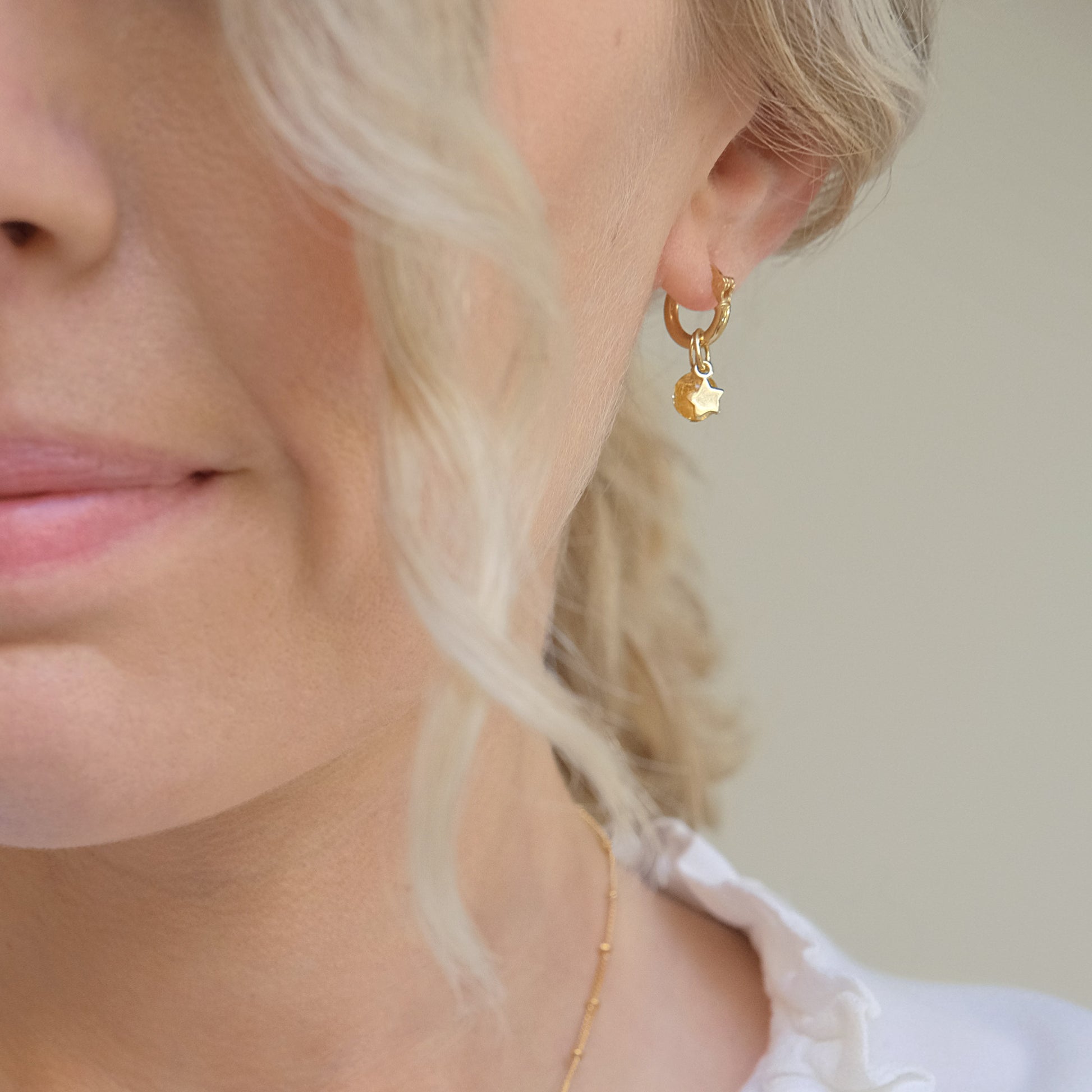 gold star earrings
