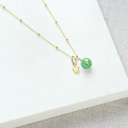 Green bead necklace with star in gold